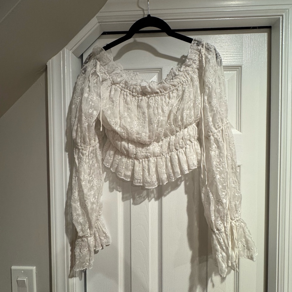 Cream Ruffled Smocked Peplum Blouse